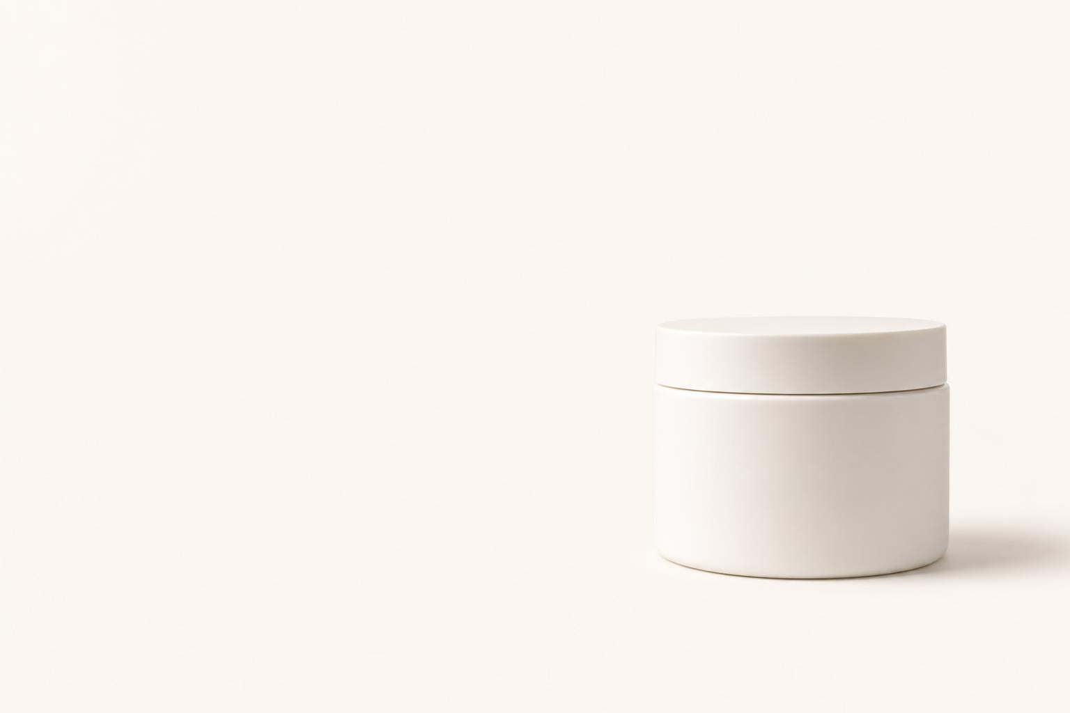 Kazven Clear Skin anti-acne cream on a minimalist cream-colored background
